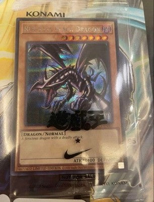 Yu-gi-oh! Red-Eyes Black Dragon Nike Promo NKC1-EN002 card and the magazine