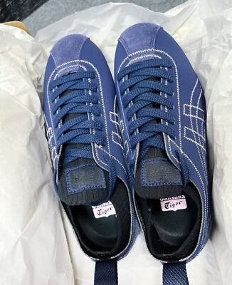 Check Description Onitsuka Tiger ONITSUKA TIGER Kura Blue and Blue color scheme